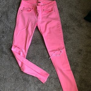 Neon pink skinny jeans